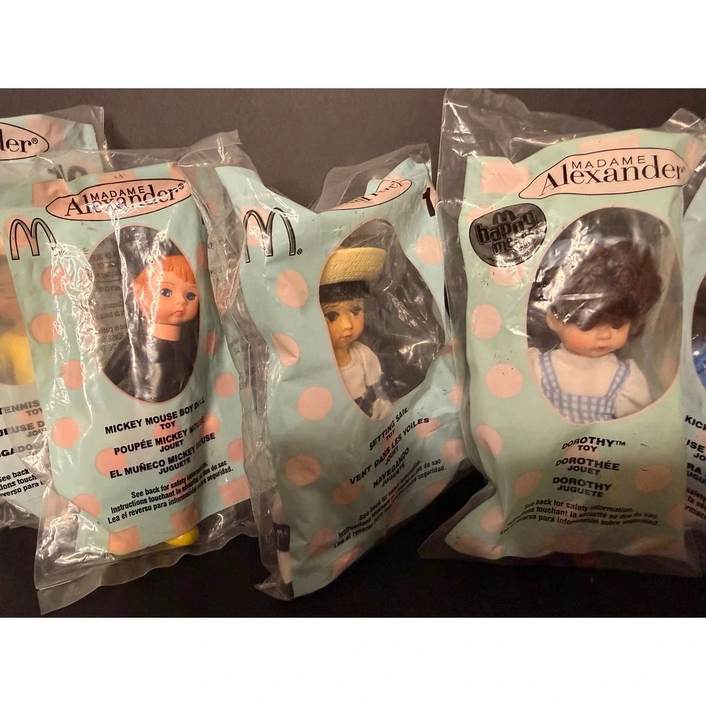 Lot of 8 Madame Alexander McDonalds Happy Meal Dolls Dorothy Mickey Cruella, etc